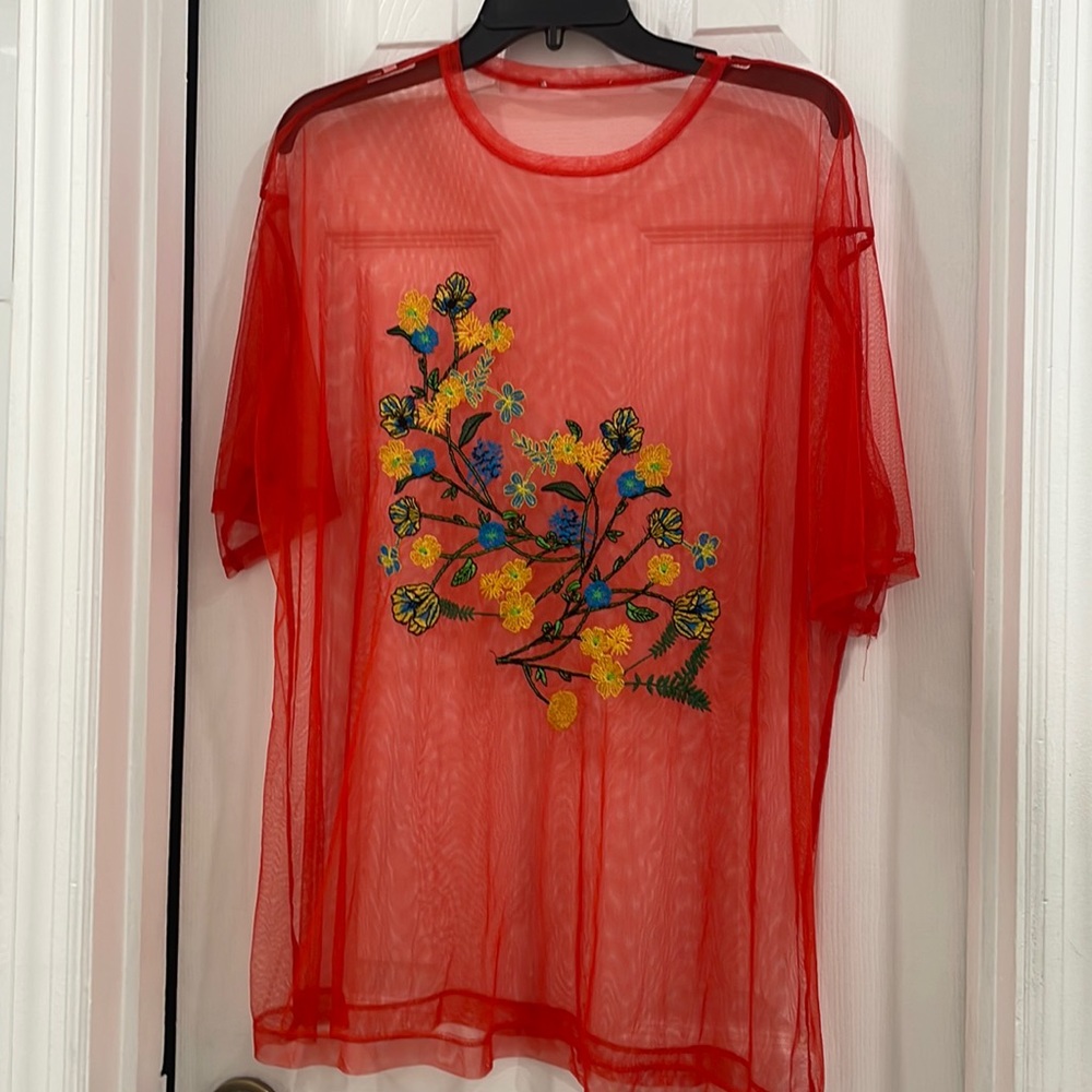 Large orange mesh blouse with yellow green and blue florals by Zara